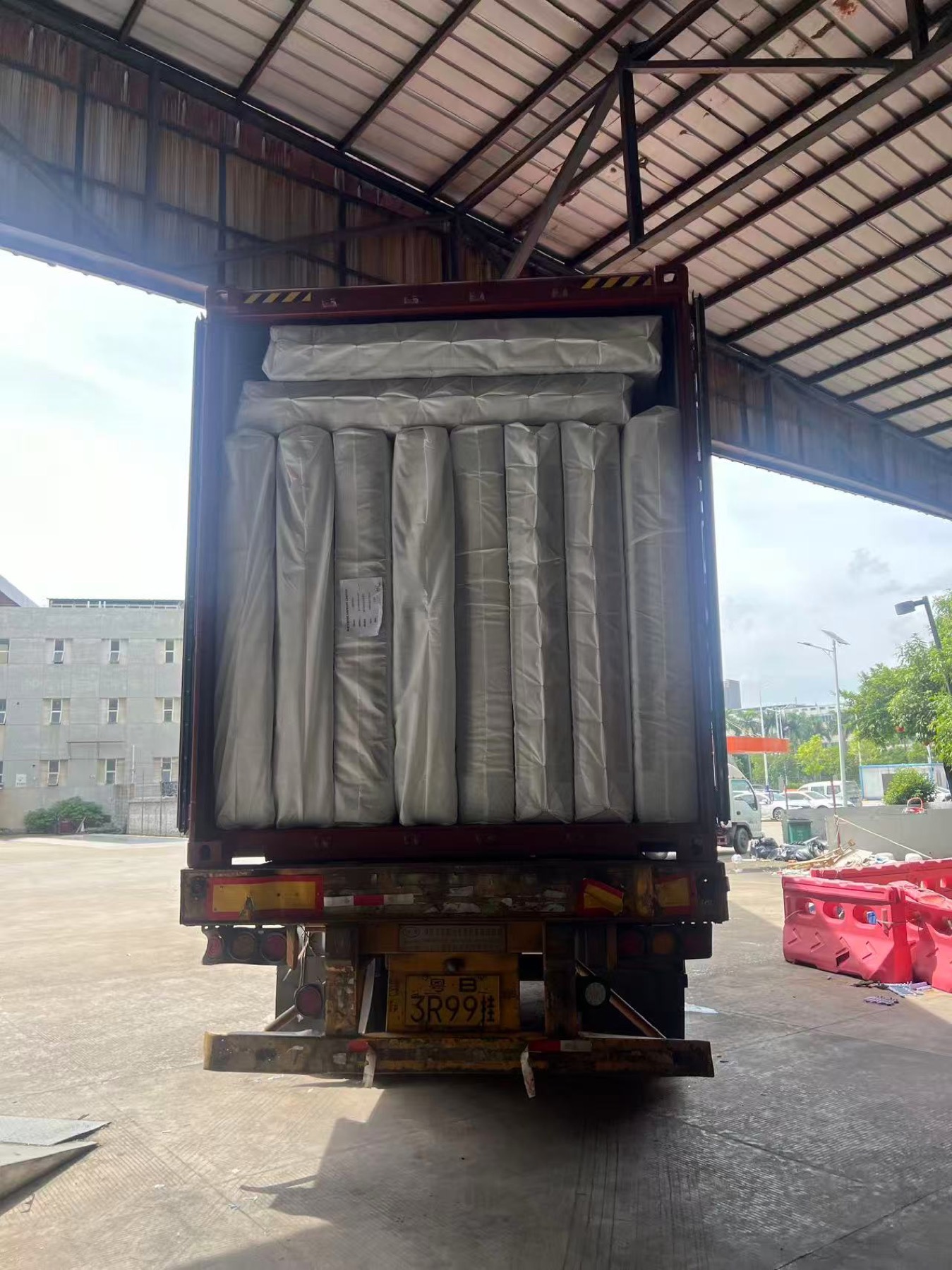 Packaged furniture loaded into an export container