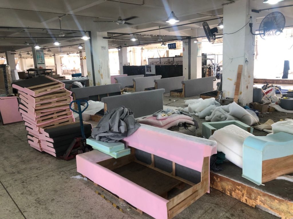 Foam-covered sofa frames prepared for upholstery assembly in a Canadian hotel project